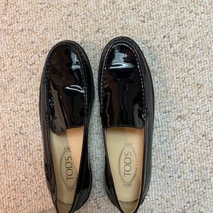 Tod’s black patent women’s loafers
